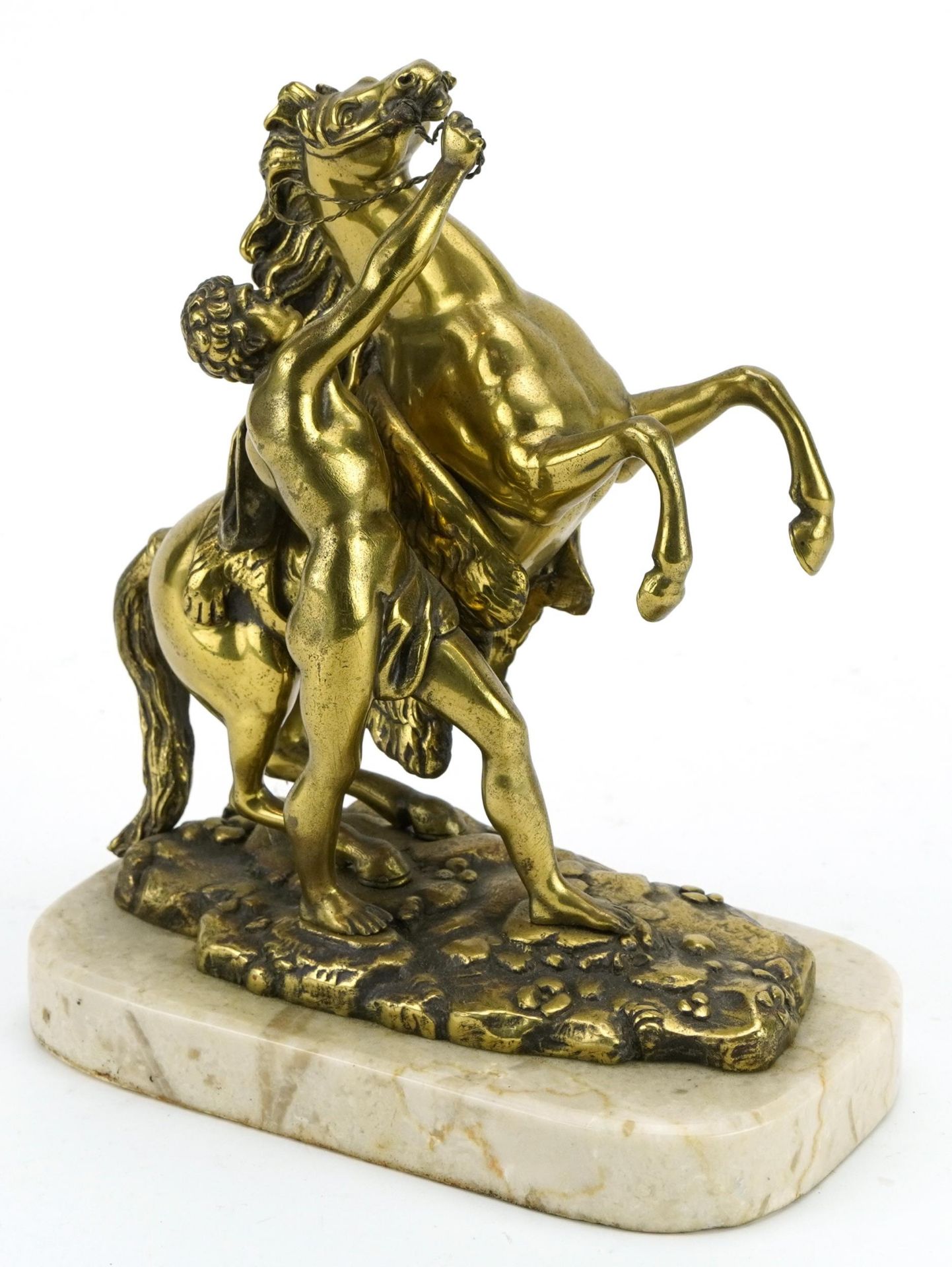 Bronzed study of a Marley horse with trainer raised on a marble base, 21.5cm high