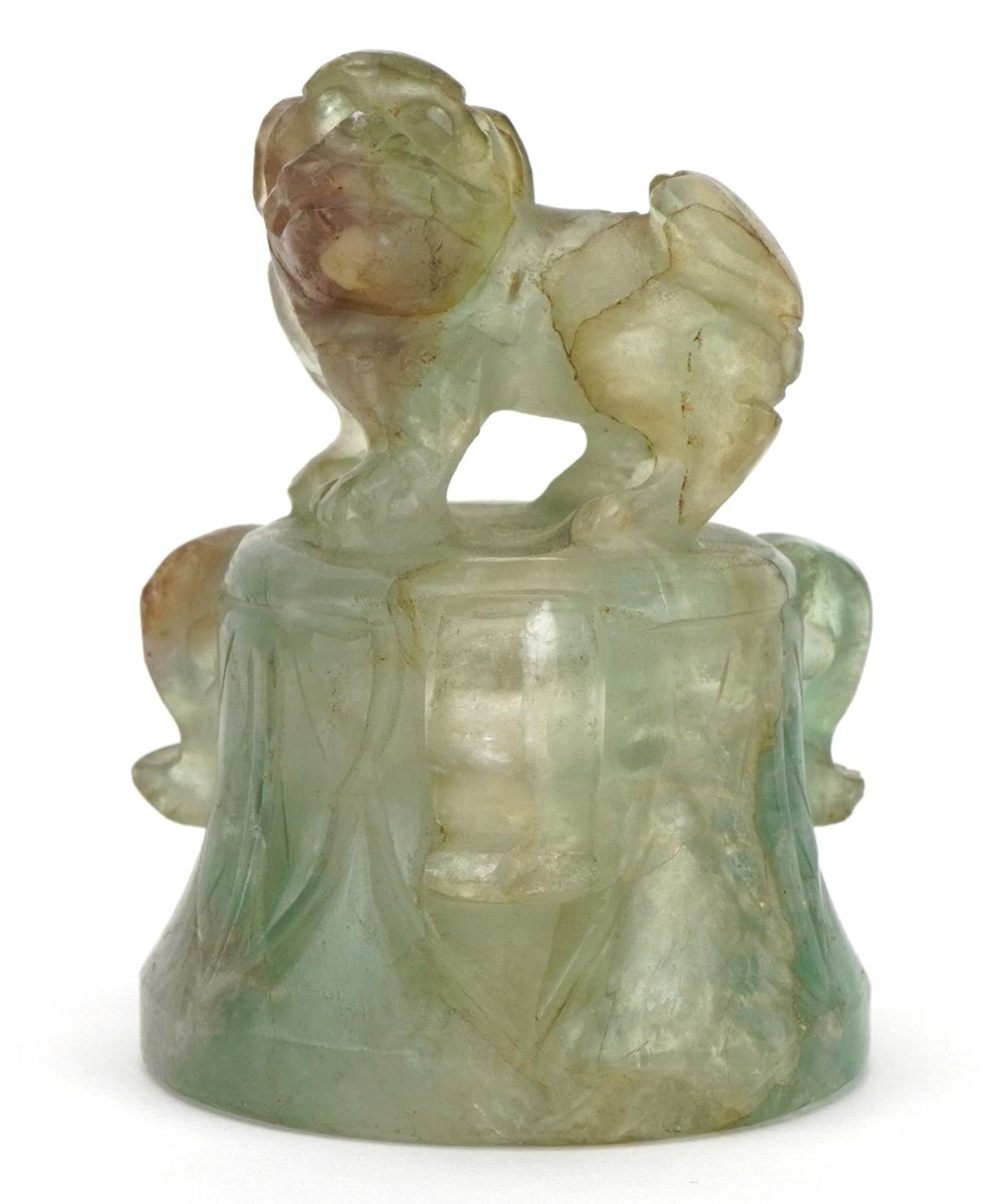 Chinese fluorite carving of an Archaic style bell with foo dog knop, 7cm high