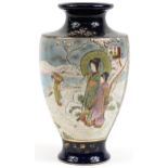 Japanese Satsuma pottery vase hand painted with figures in a snowy landscape, 32cm high