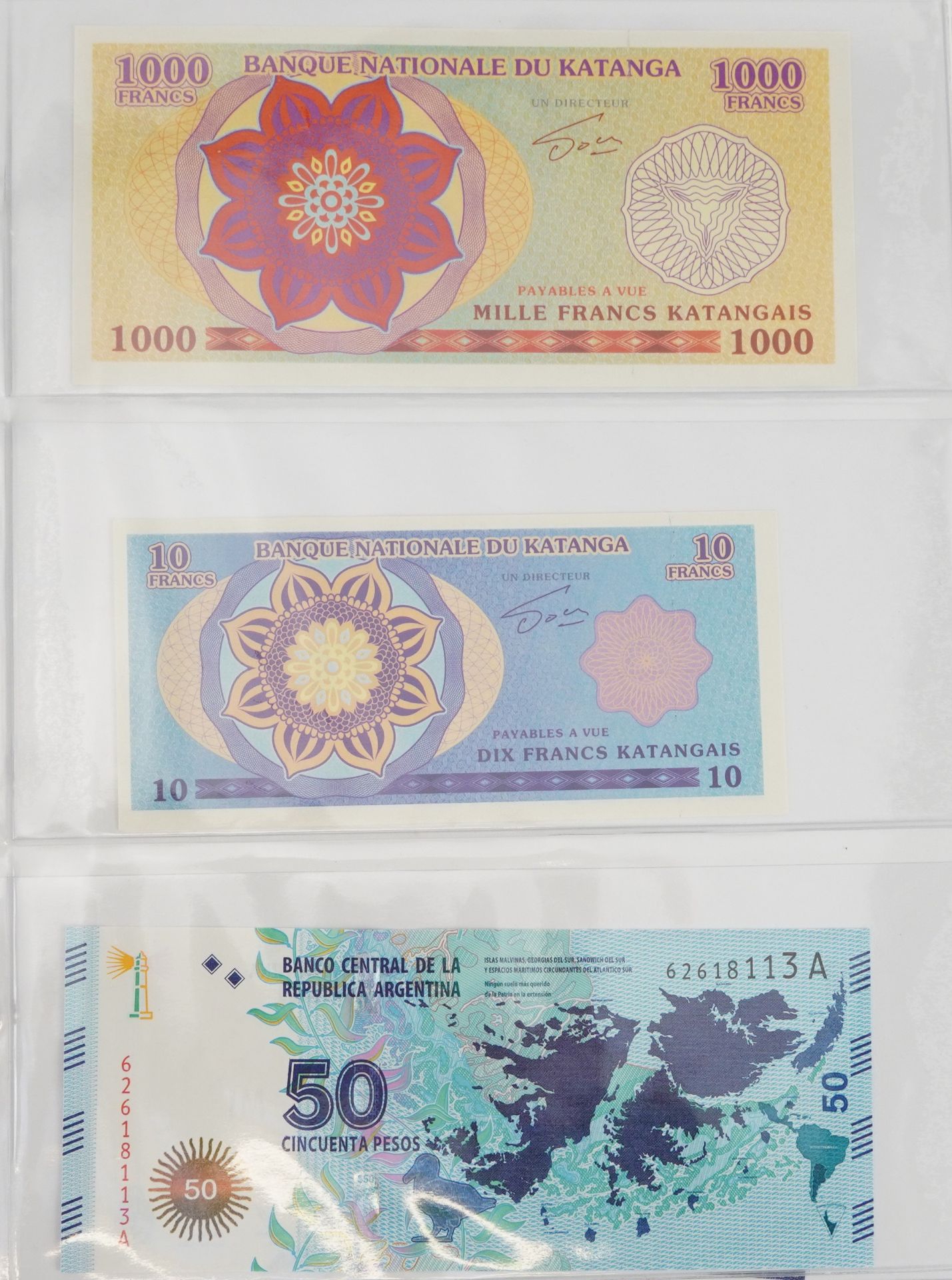 World banknotes arranged in an album including Arctic Territories, South Pacific States and Cayman - Bild 4 aus 6