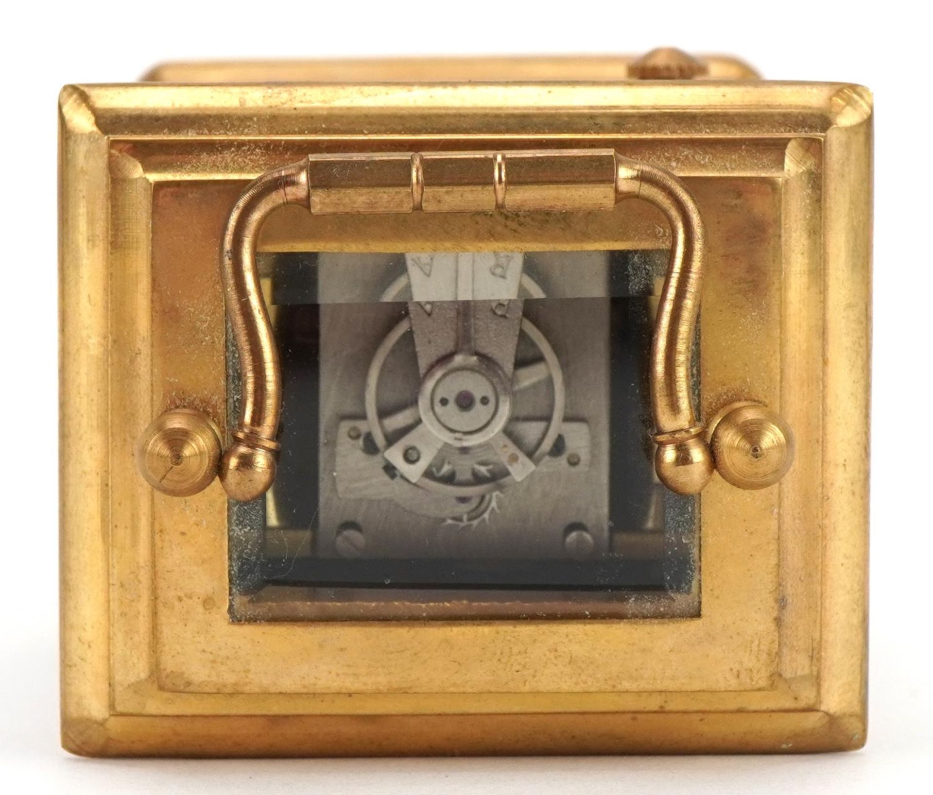 Miniature brass cased carriage clock with swing handle and Sevres style panels, hand painted with - Image 4 of 5