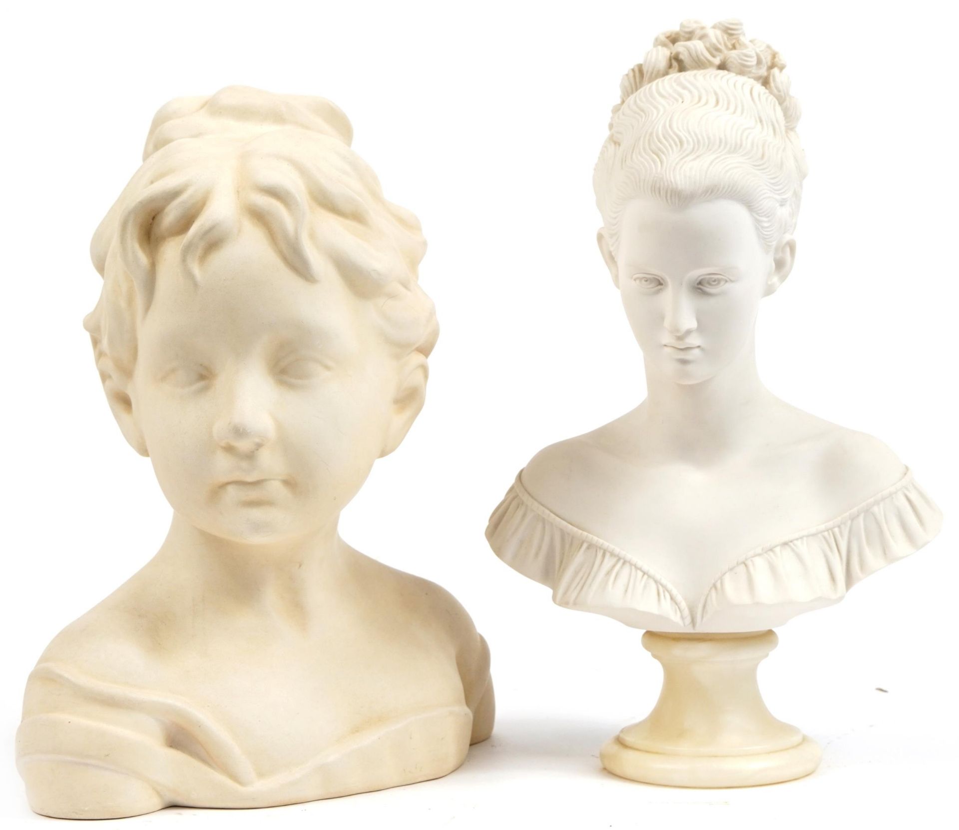 Two parian style busts of young females, the largest 34cm high