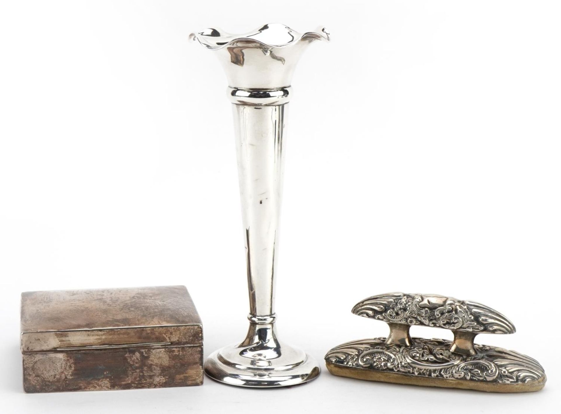 Silver objects comprising square cigarette case, trumpet bud vase and silver mounted ink blotter,