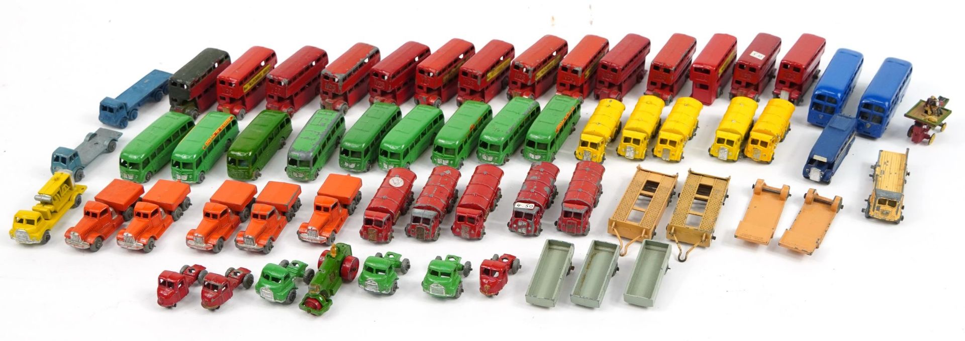 Collection of miniature Lesney diecast vehicles including London buses