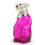 Cranberry coloured glass claret jug in the form of a bear with silver plated mount, 22cm high