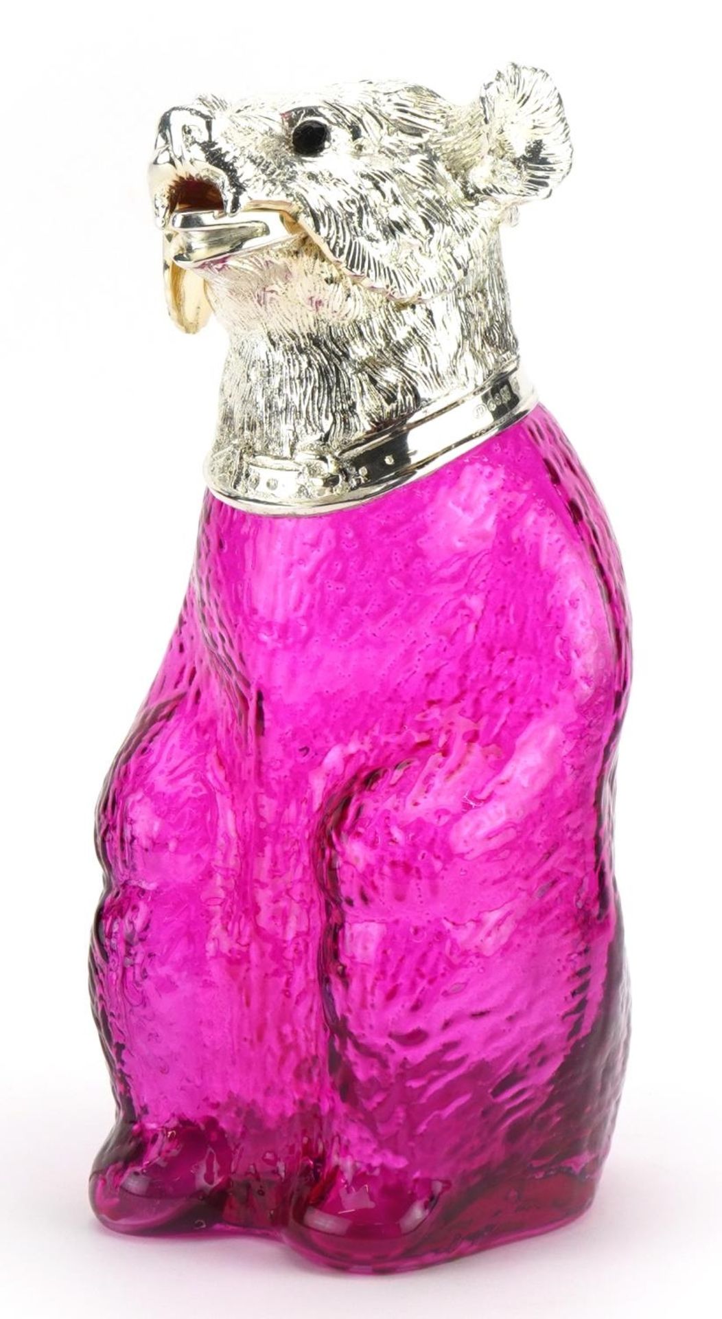 Cranberry coloured glass claret jug in the form of a bear with silver plated mount, 22cm high