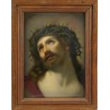 Manner of KPM, continental rectangular porcelain panel hand painted with Christ wearing a crown of