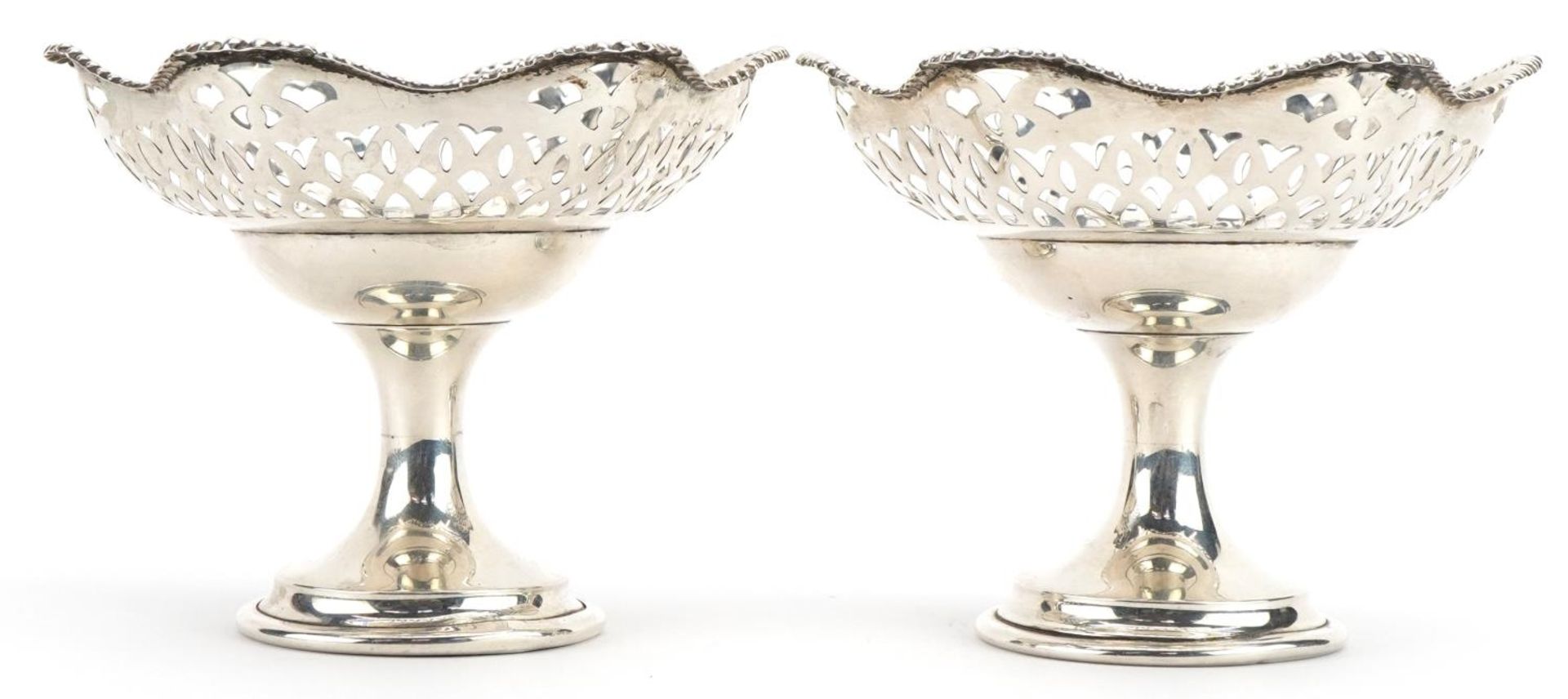 Alexander Clark & Co Ltd, pair of George VI silver pedestal pierce bonbon dishes, Birmingham 1939,