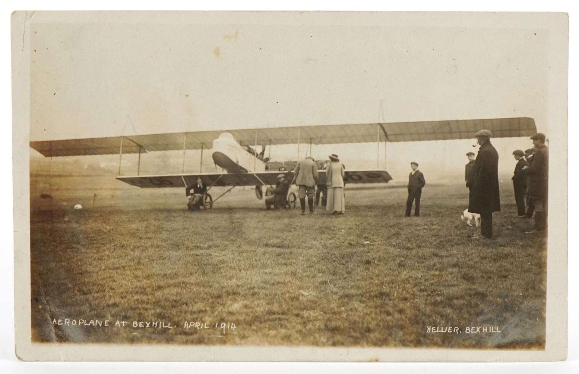 Early 20th century black and white photographic postcard of an aeroplane at Bexhill April 1914