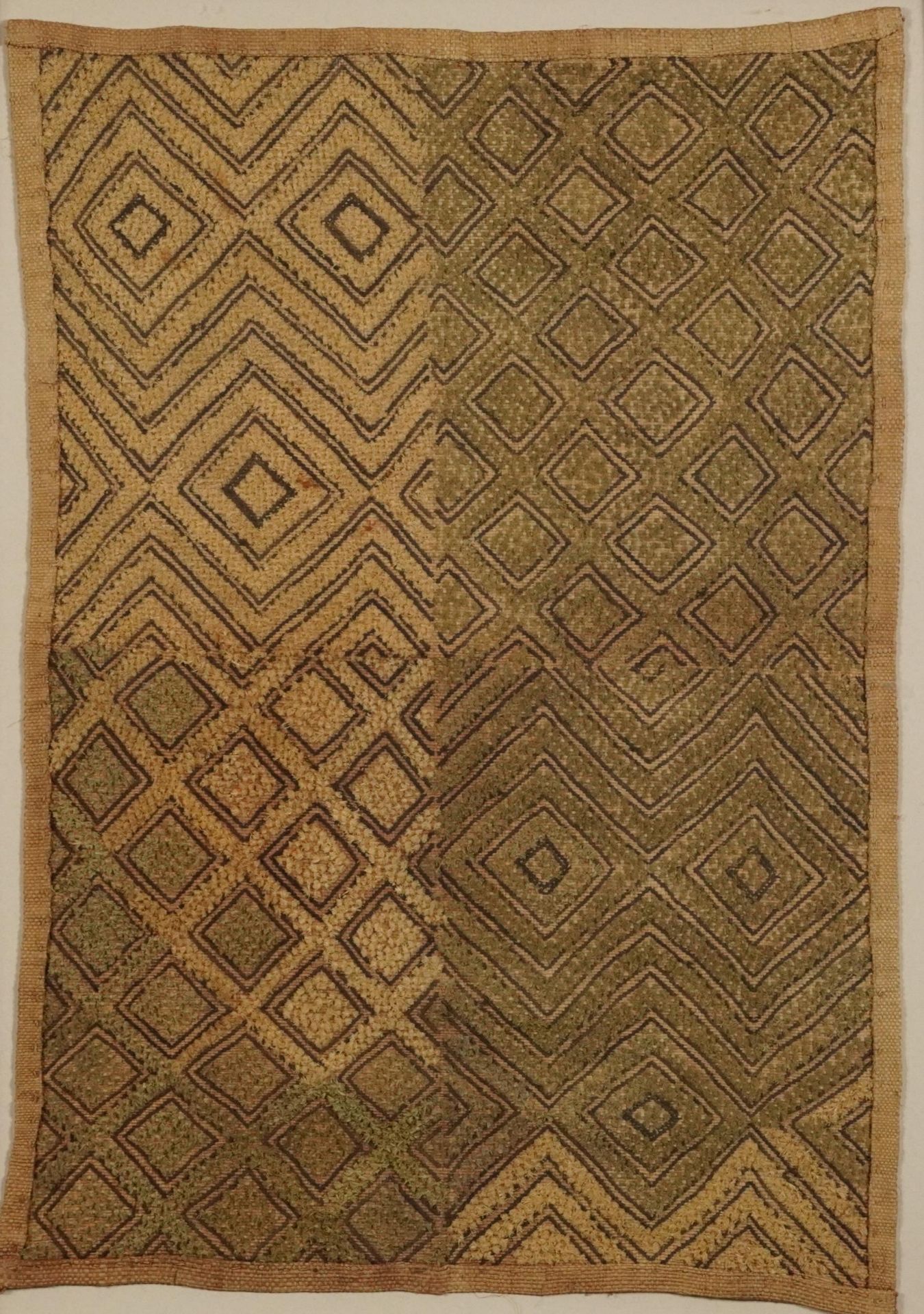 African Kuba cloth textile, framed and glazed, 51cm x 35cm excluding the frame