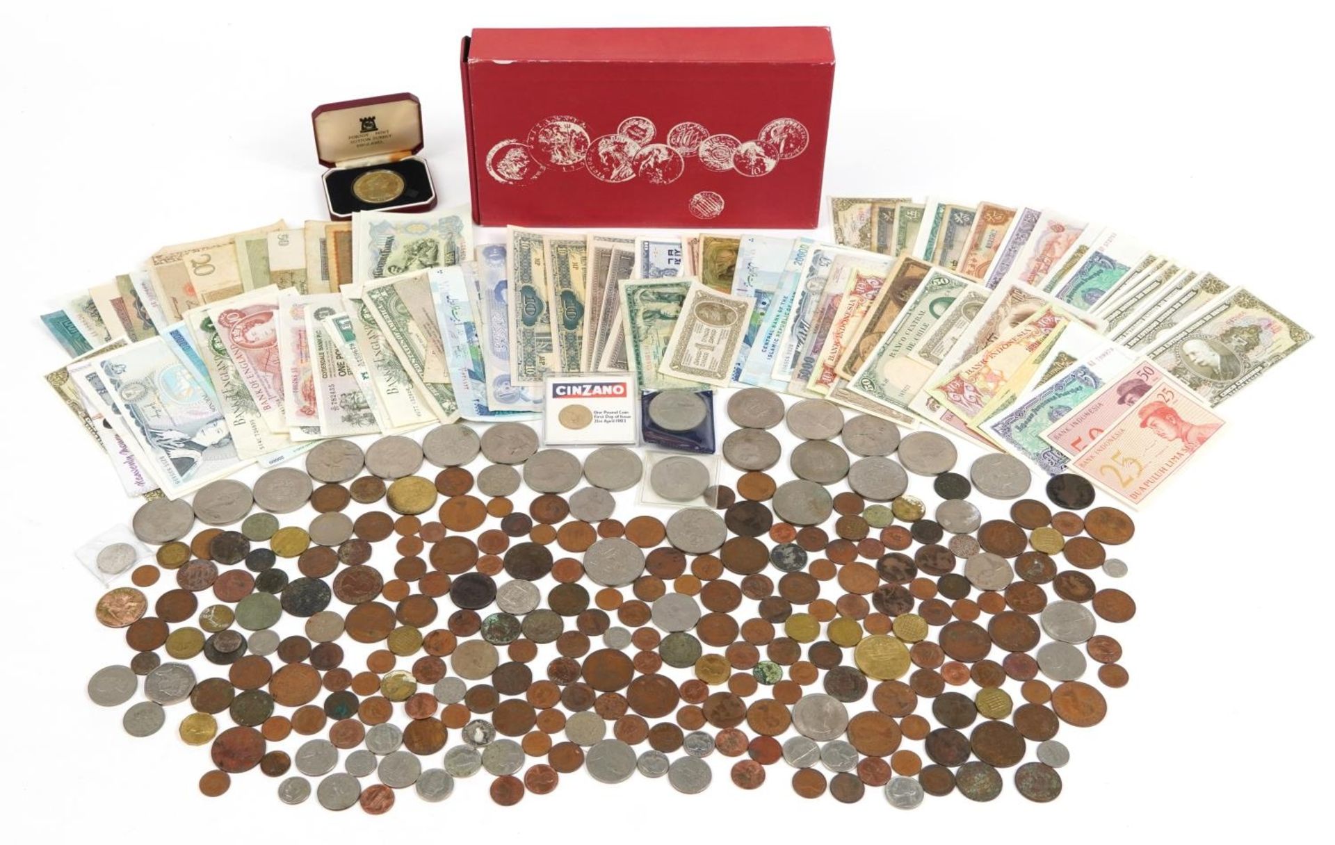 Collection of antique and later British and world coinage and banknotes, some arranged in an