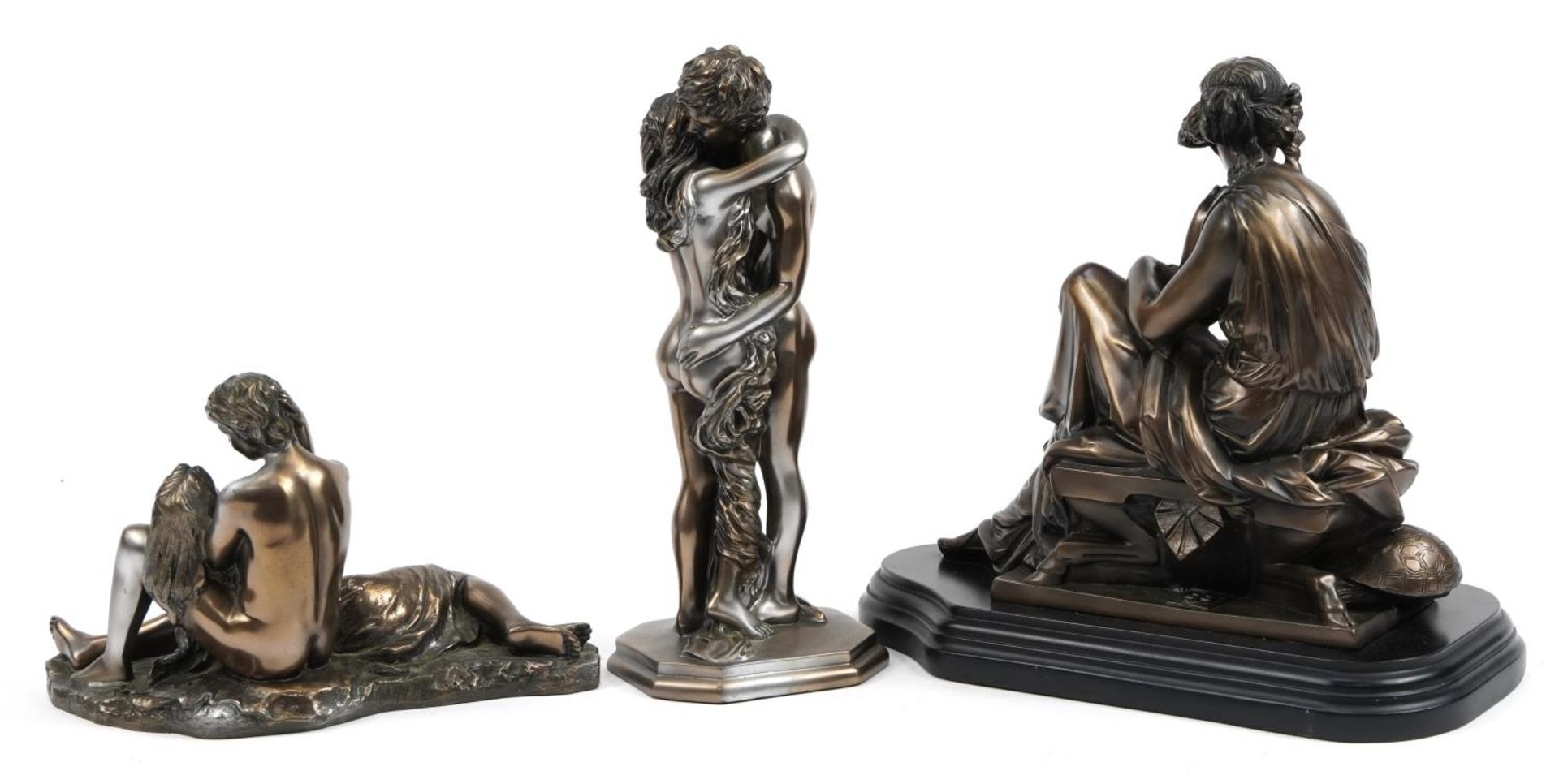 Two bronzed figure groups of erotic couples and a female seated on a stool, the largest 31cm in - Image 2 of 3