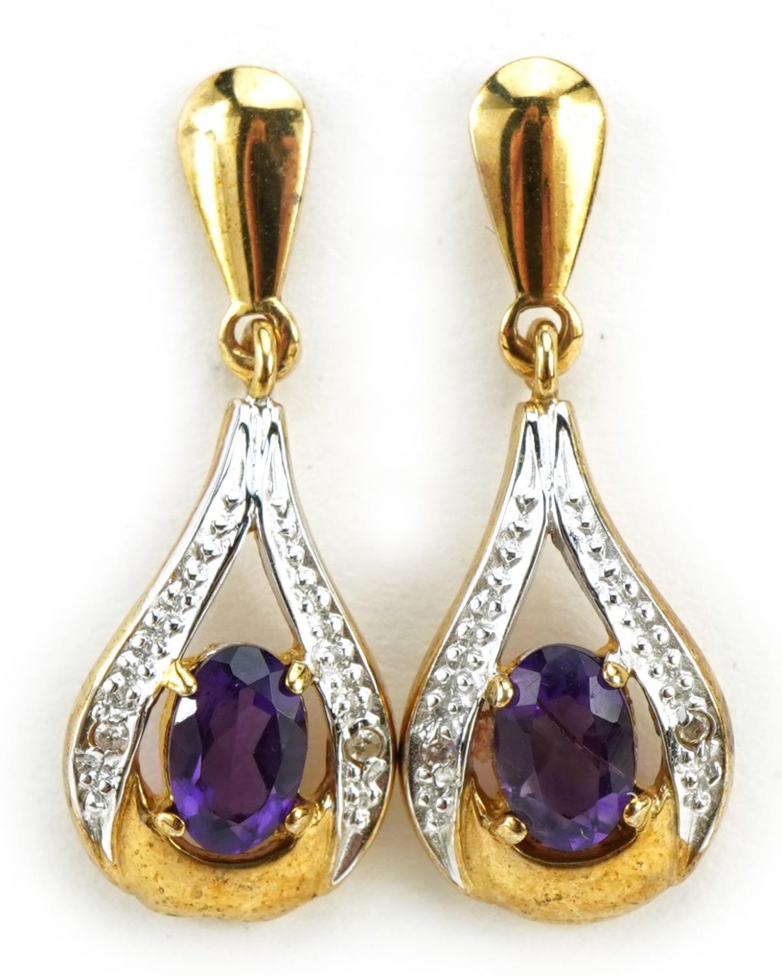 Pair of unmarked gold amethyst and diamond drop earrings, 2.5cm high, 2.0g