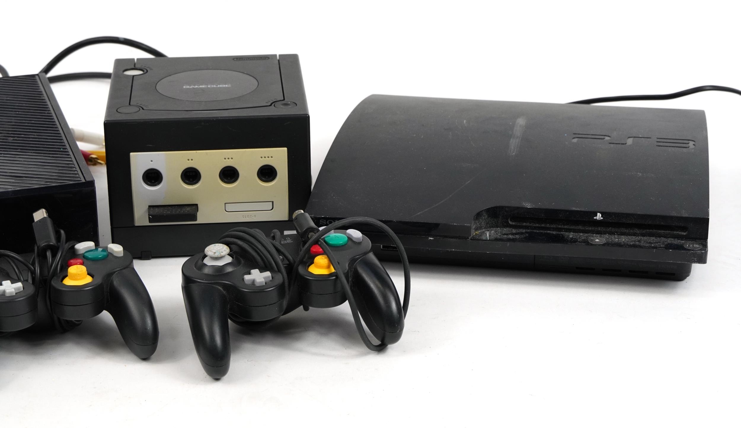 Three games consoles with controllers comprising Play Station 3, Nintendo Gamecube and Xbox - Image 3 of 3
