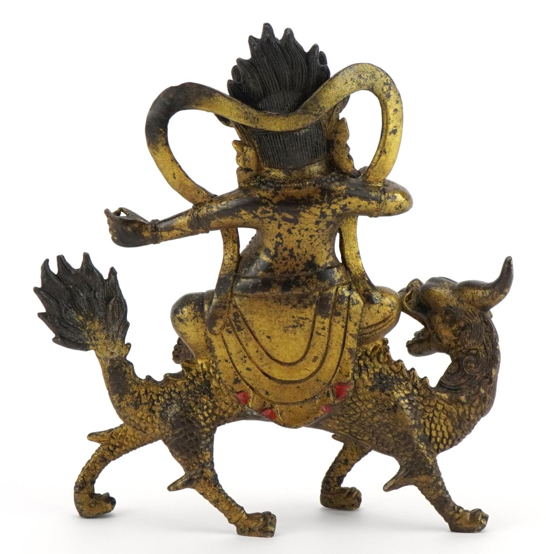 Chinese gilt bronze of a figure seated on a mythical animal, 19.5cm high - Image 2 of 3