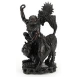 Chinese root carving of a mythical figure and animal, 39cm high