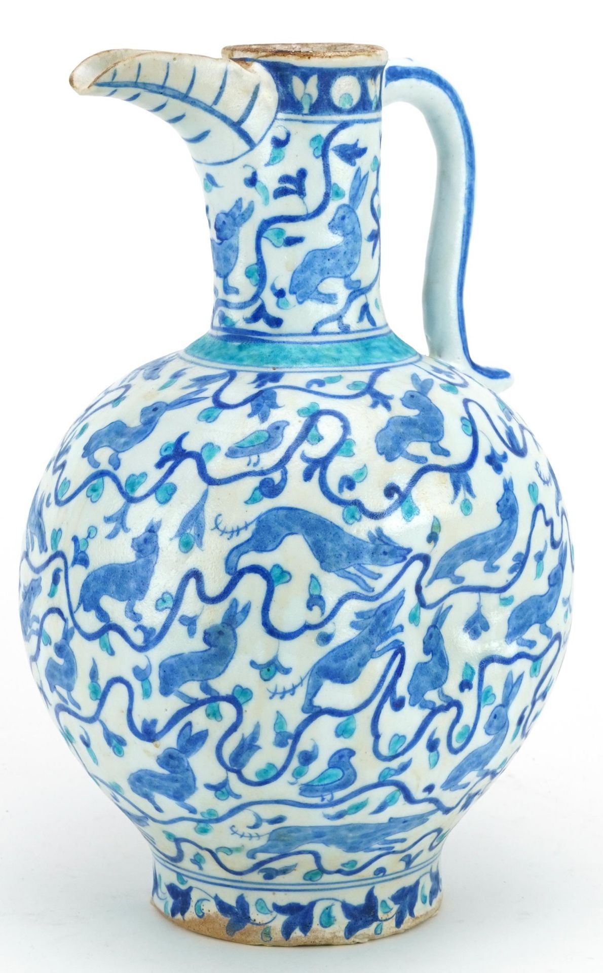 Turkish Ottoman Iznik pottery water jug hand painted with wild animals and flowers, 29cm high