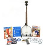 Remo Weatherking rosewood banjo with stand, bare strings and music books