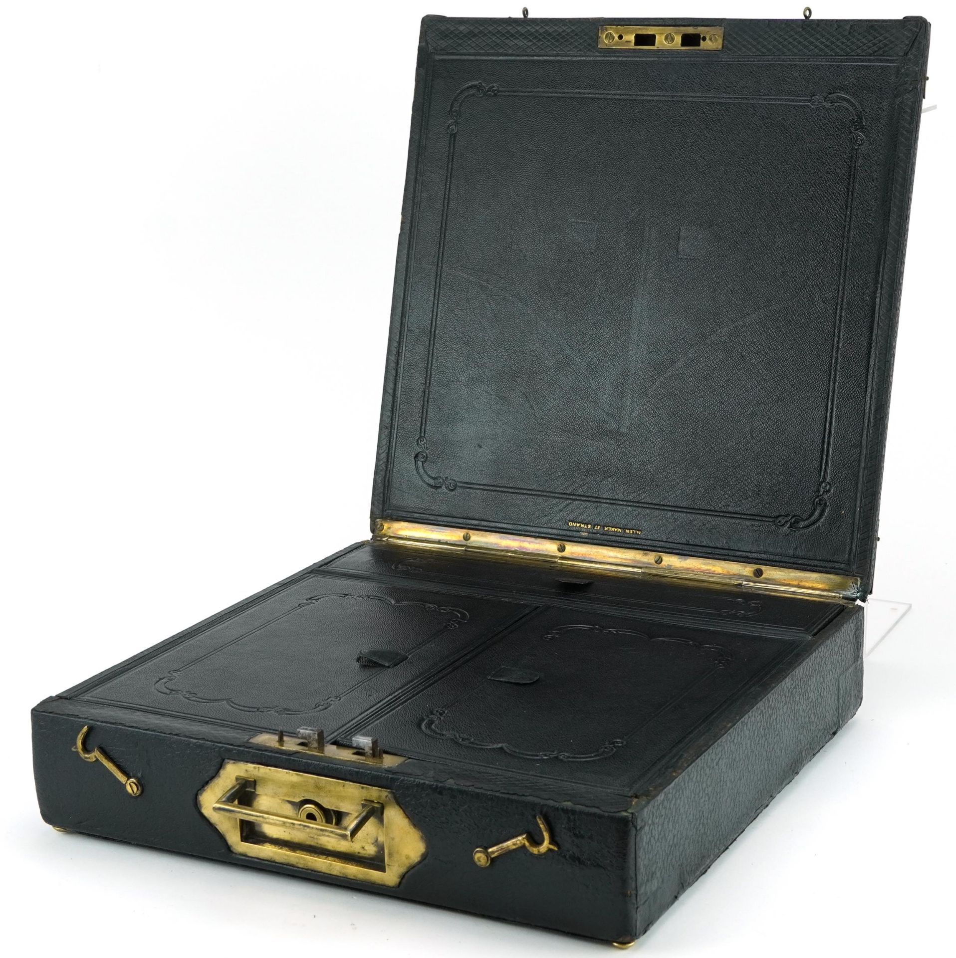 Tooled leather folding Campaign writing box with brass mounts, retailed by Allen. Maker, 37