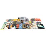 Crossley CR6017A record player with a collection of vinyl LP records including Talking Heads,