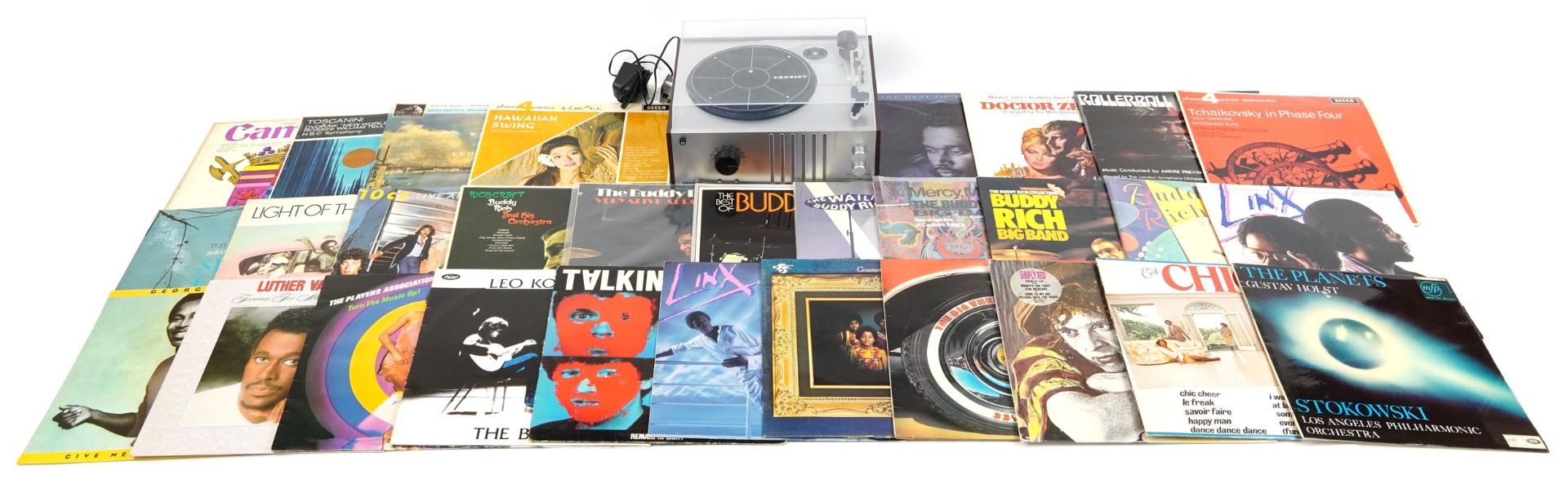 Crossley CR6017A record player with a collection of vinyl LP records including Talking Heads,
