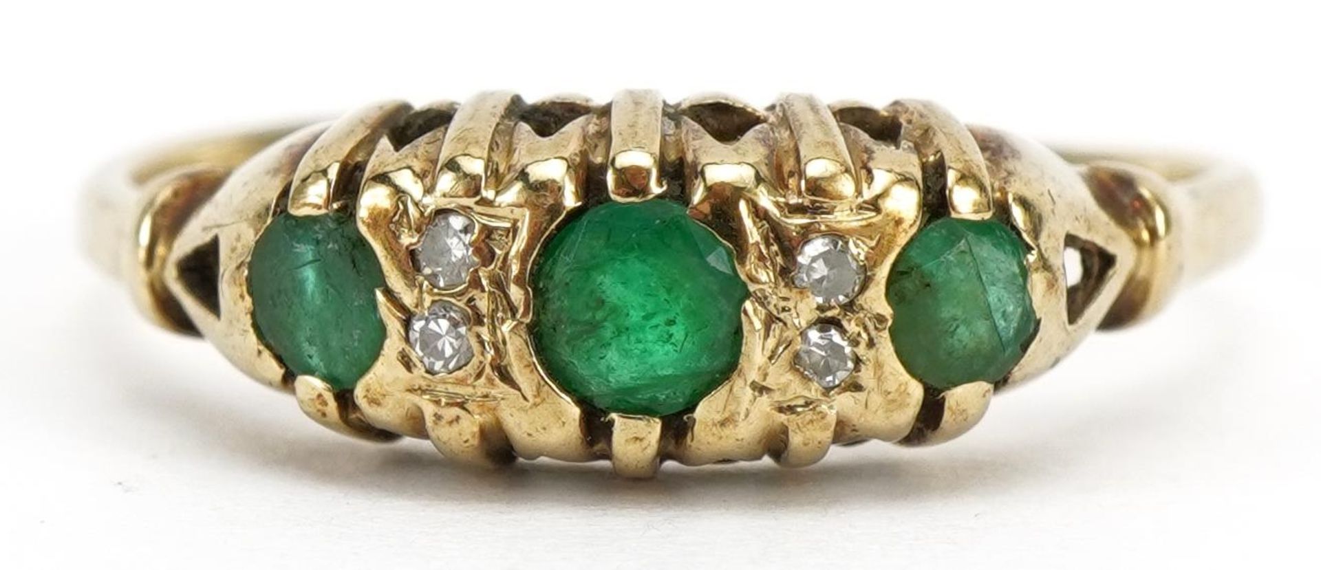 9ct gold emerald and diamond seven stone ring, size P, 1.6g