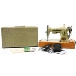 Vintage cased Sovereign electric sewing machine