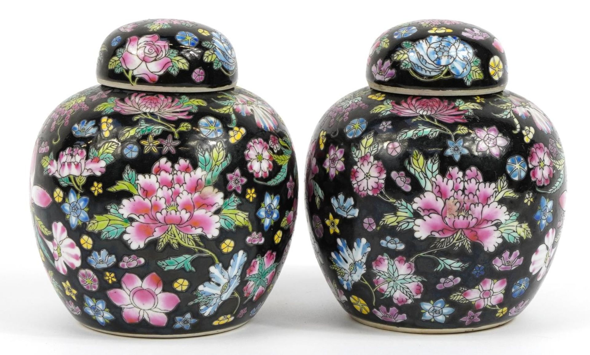 Pair of Chinese porcelain ginger jars and covers hand painted in the famille noire palette with