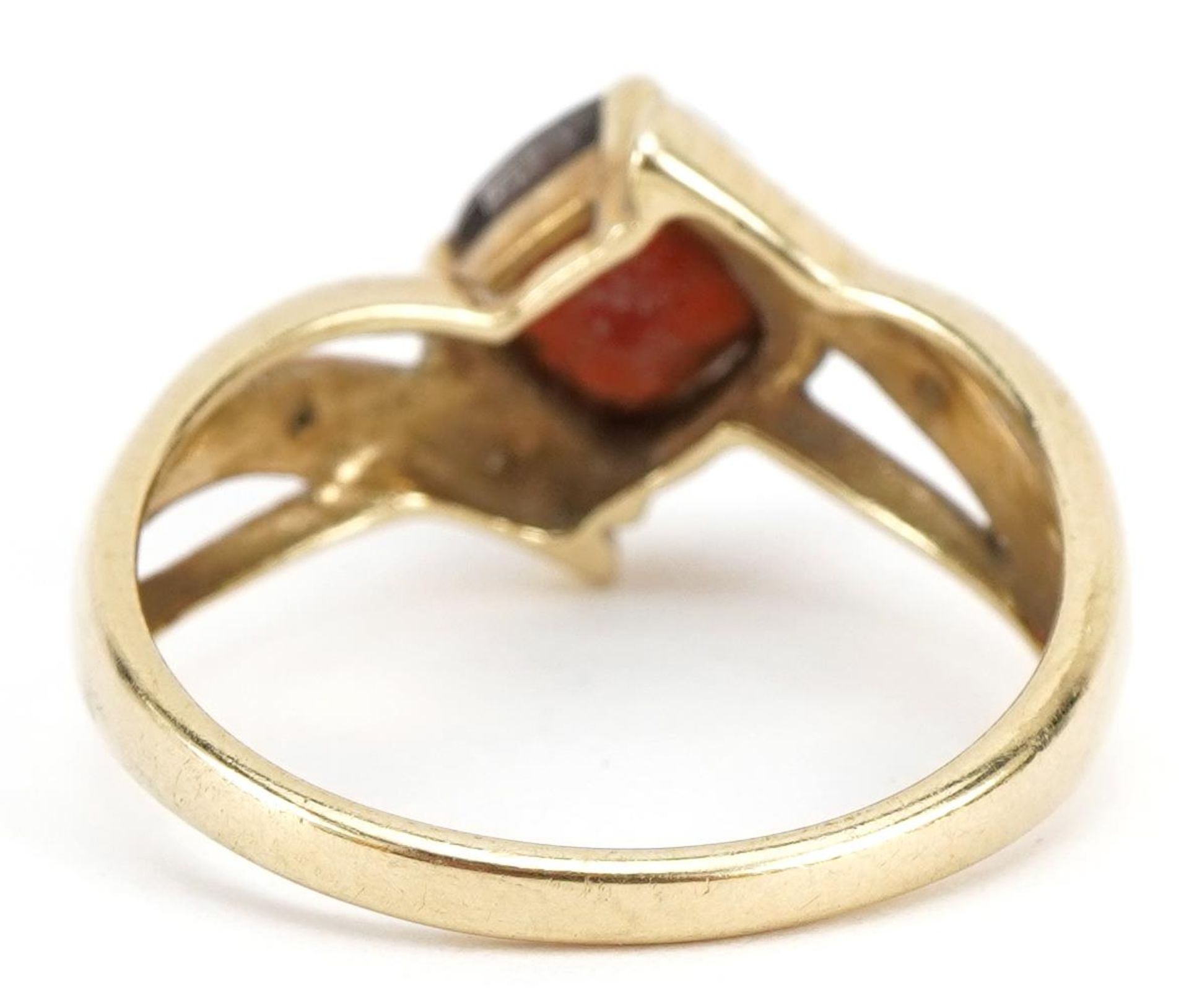 9ct gold garnet and diamond crossover ring, the garnet approximately 7.0mm x 7.0mm, size R, 3.2g - Bild 2 aus 3