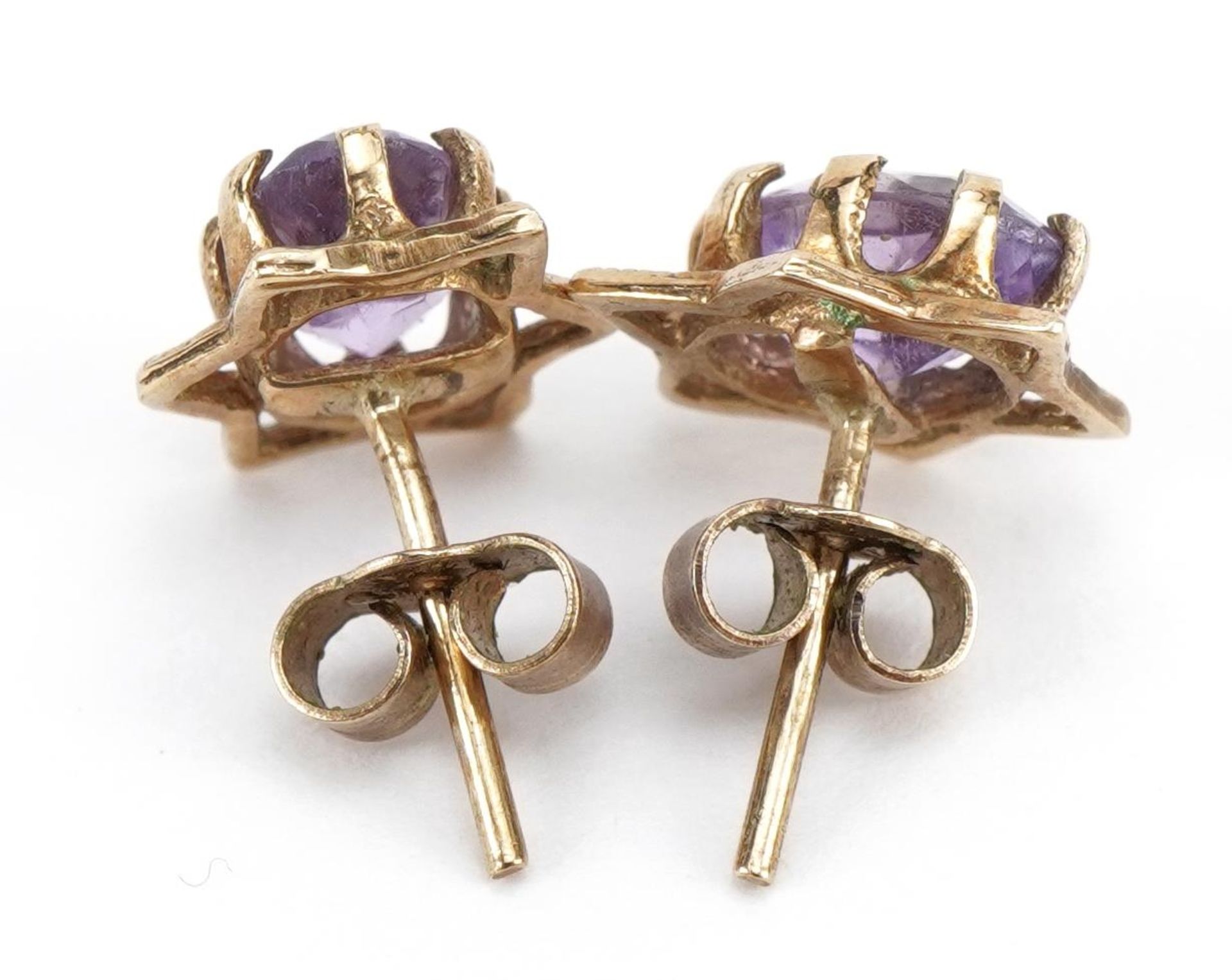 Pair of 9ct gold amethyst stud earrings, 9mm high, 1.4g - Image 2 of 2