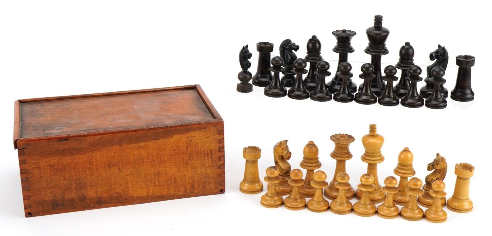 Boxwood and ebonised Staunton pattern chess set with wooden case, the largest pieces each 8.5cm high