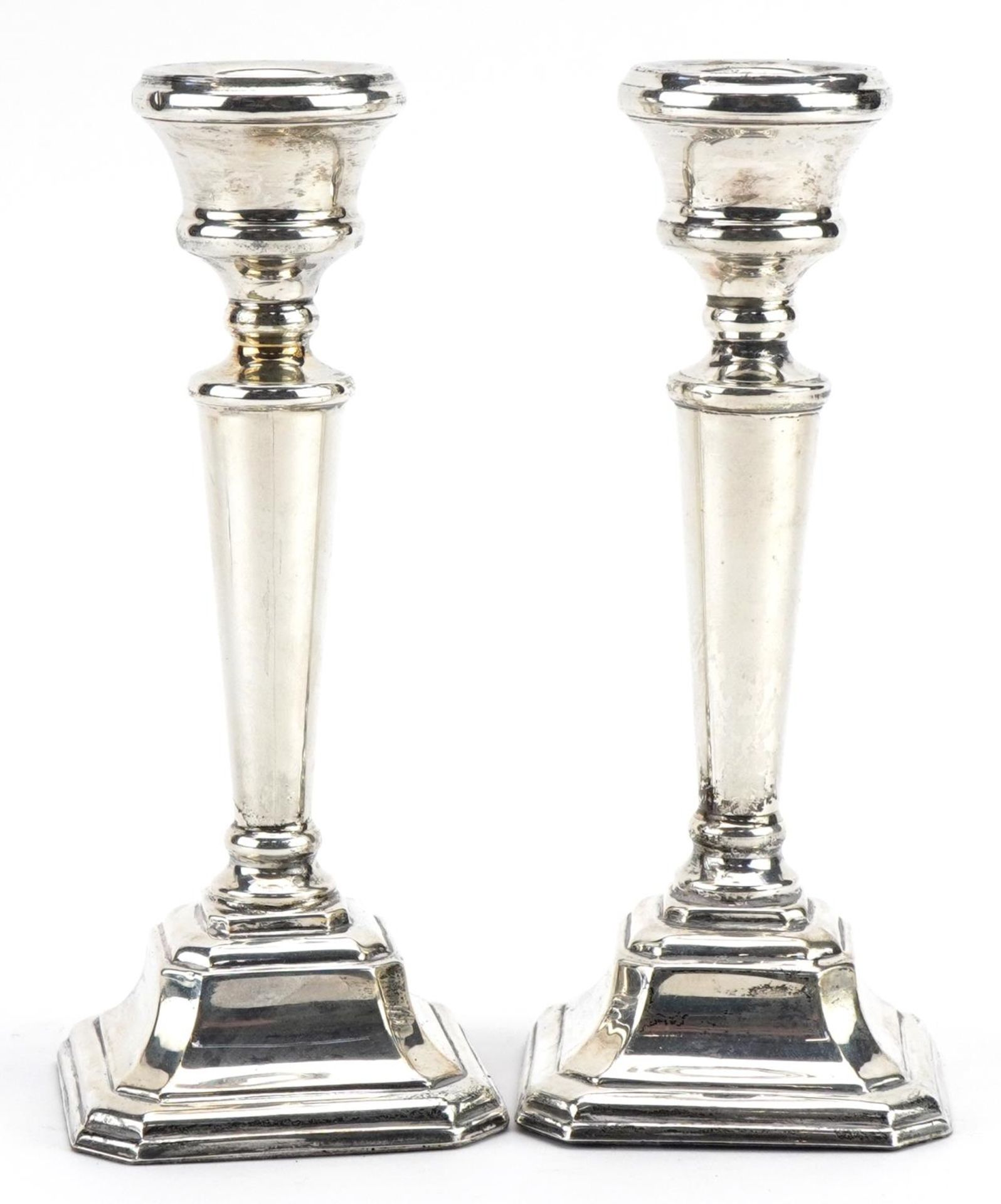 John Bull Ltd, matched pair of Elizabeth II silver square base candlesticks, Birmingham 1997 and