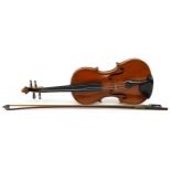 Old wooden violin and bow with case, the violin bearing an Antonius Stradivarius paper label, the