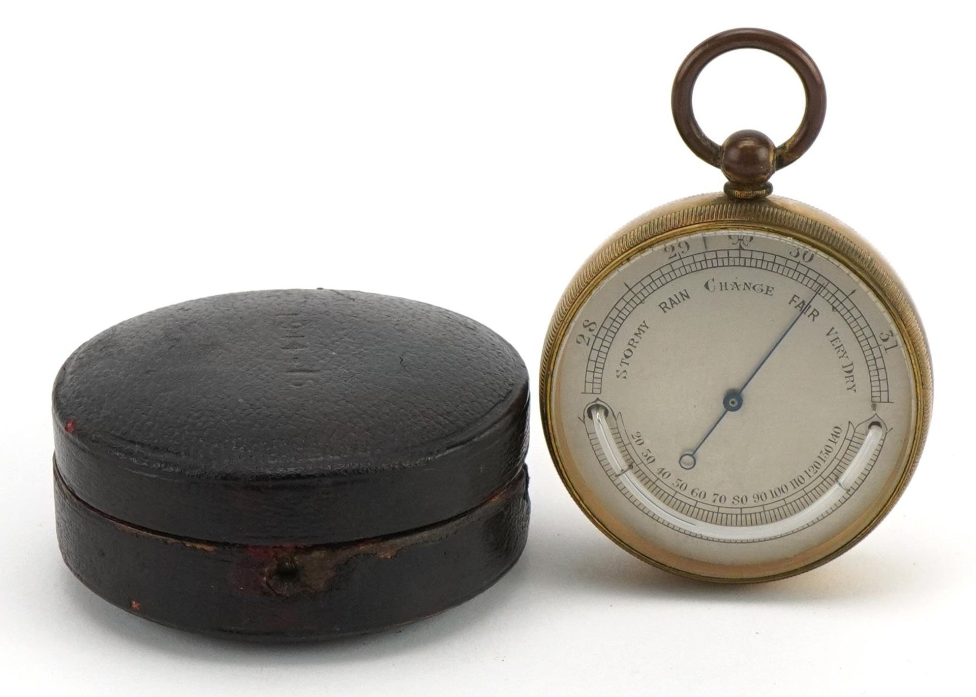 19th century gilt brass compensated pocket barometer with silvered dial and leather case, 5.5cm high