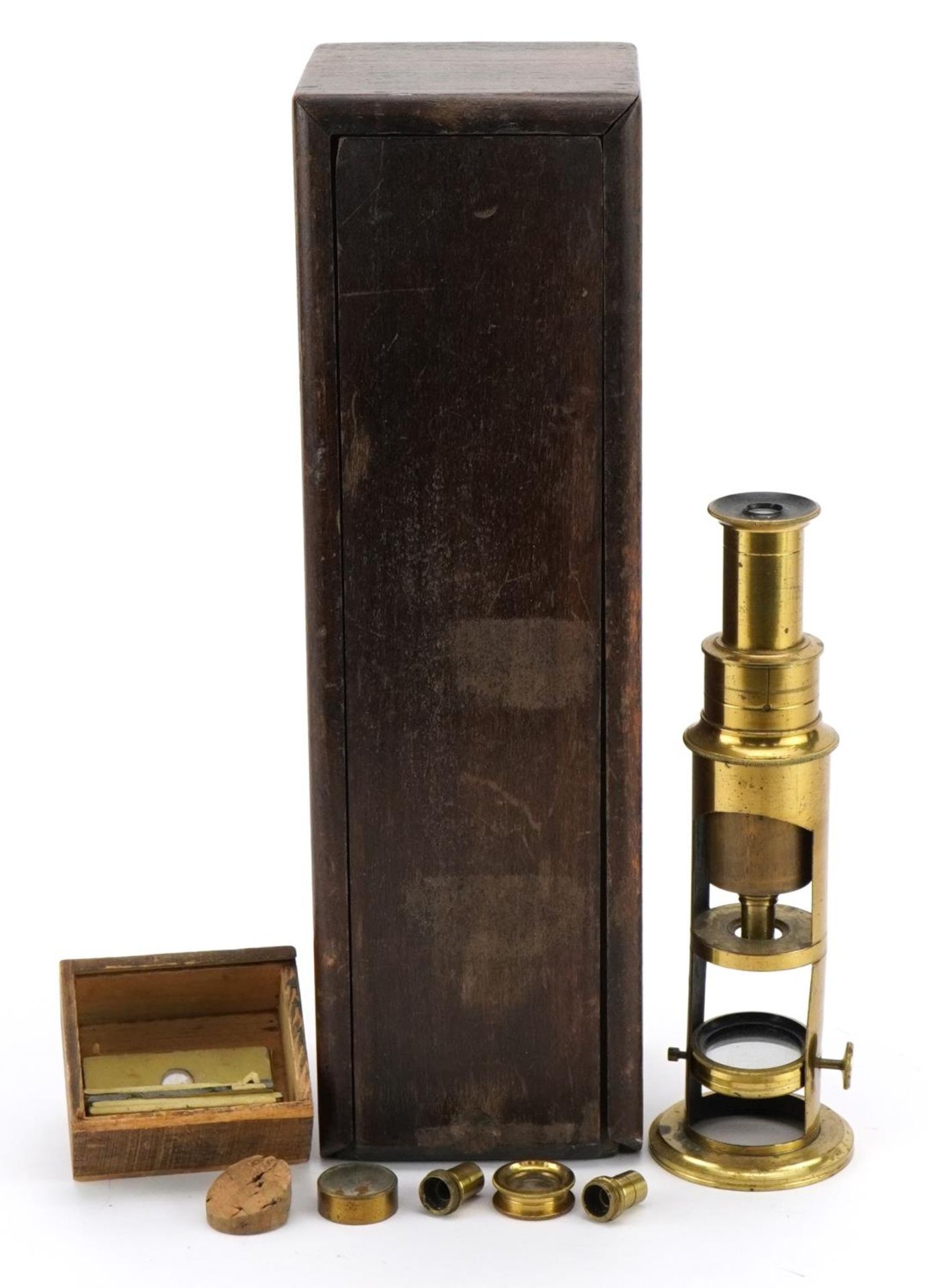 19th century brass student's microscope with case and accessories, 20.5cm high