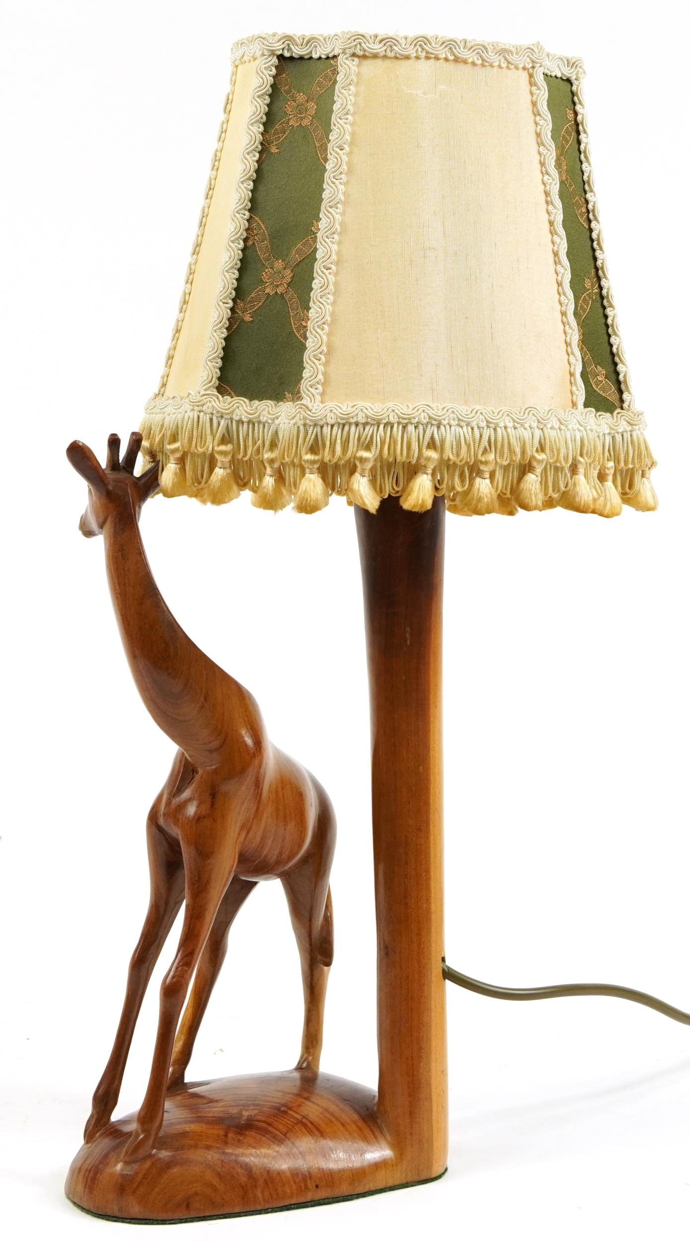 African carved wood table lamp with shade in the form of a giraffe, 48cm high - Image 2 of 3