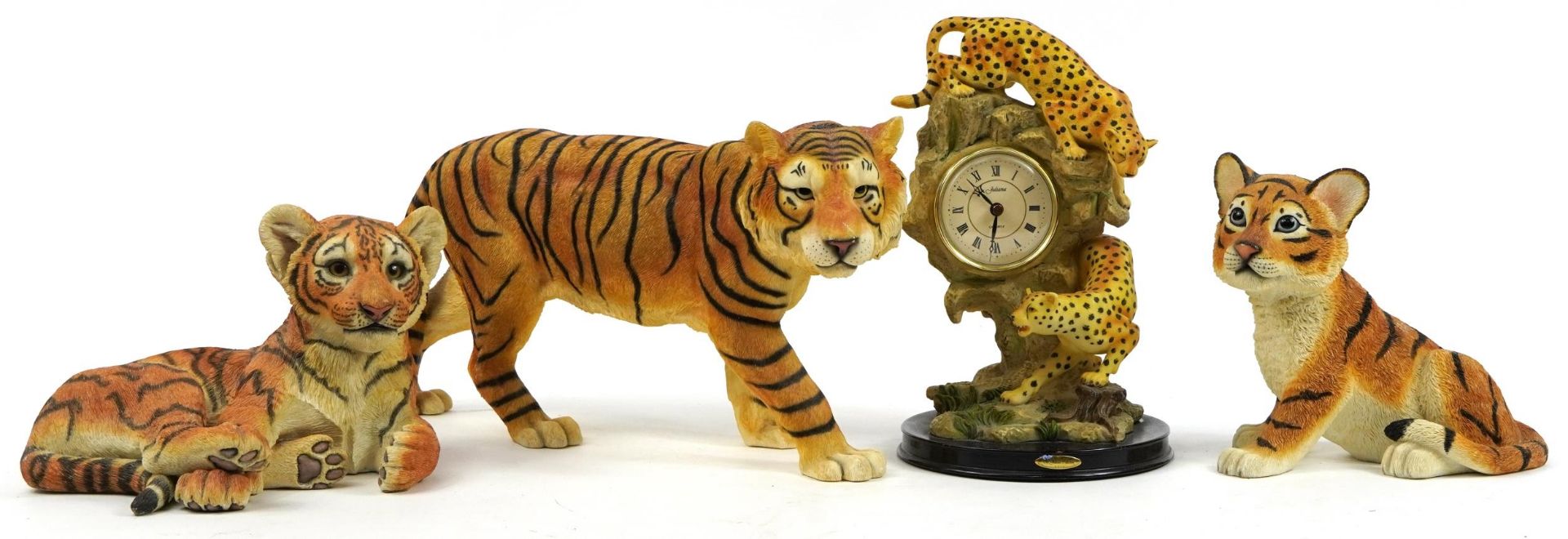 Three large tiger models from the Leonardo Collection and Country Artists together with a Juliana