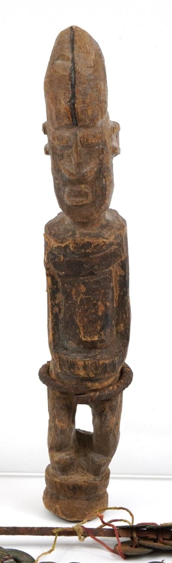 Tribal interest carved wood figure and two Chinese cash coins design swords, the largest 44cm in - Image 2 of 4