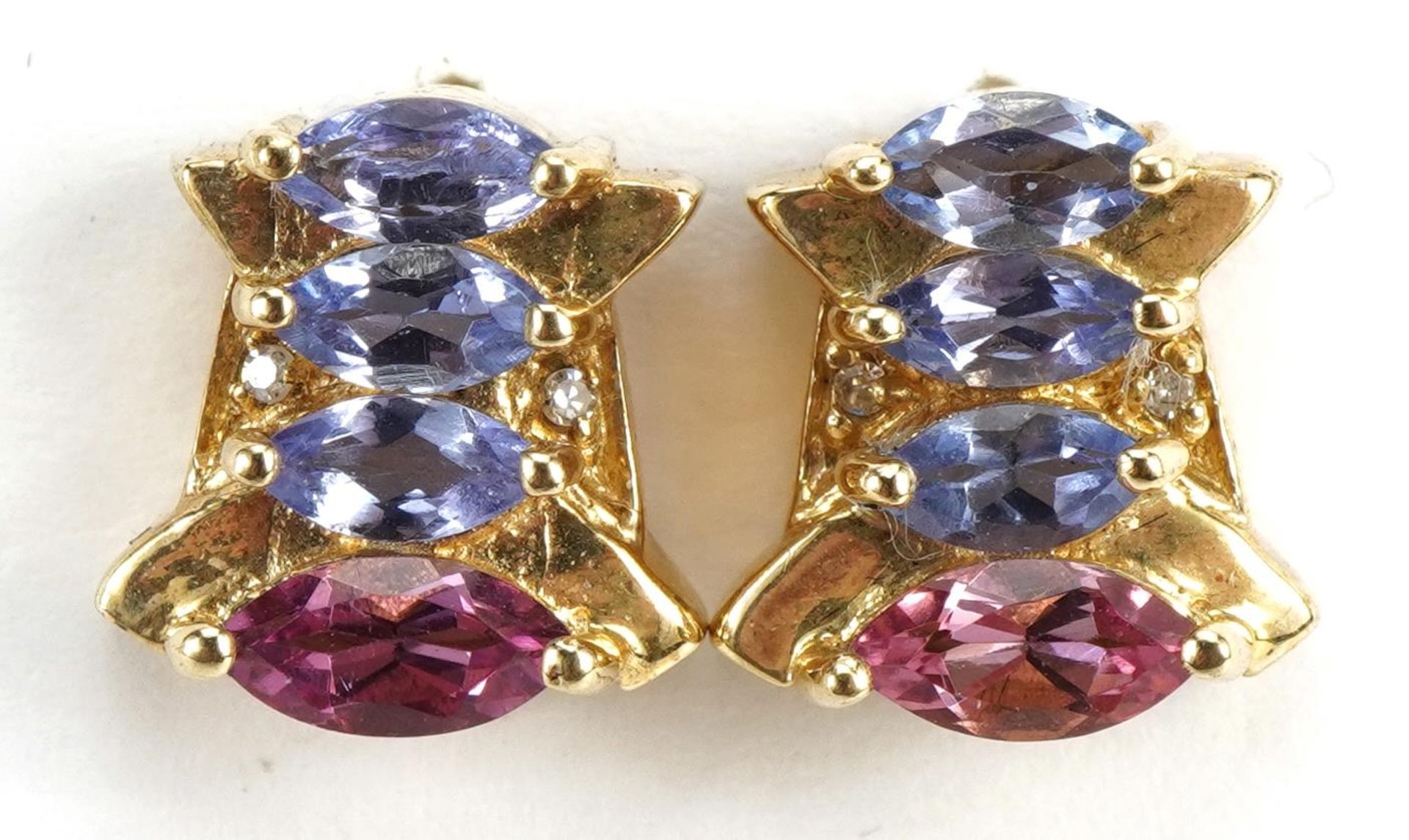 Pair of 9ct gold purple and pink stone stud earrings, each set with two diamonds, 1.1cm high, 4.1g