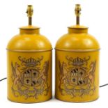 Pair of Toleware metal lamps, each hand painted with heraldic crests, each 45cm high including