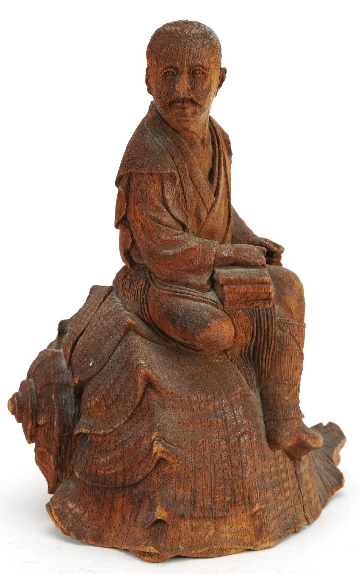 Chinese hardwood carving of a man seated on a shell, incised character marks to the base