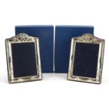 Carr's of Sheffield, pair of silver easel photo frames embossed with swags, each Chester 1997,