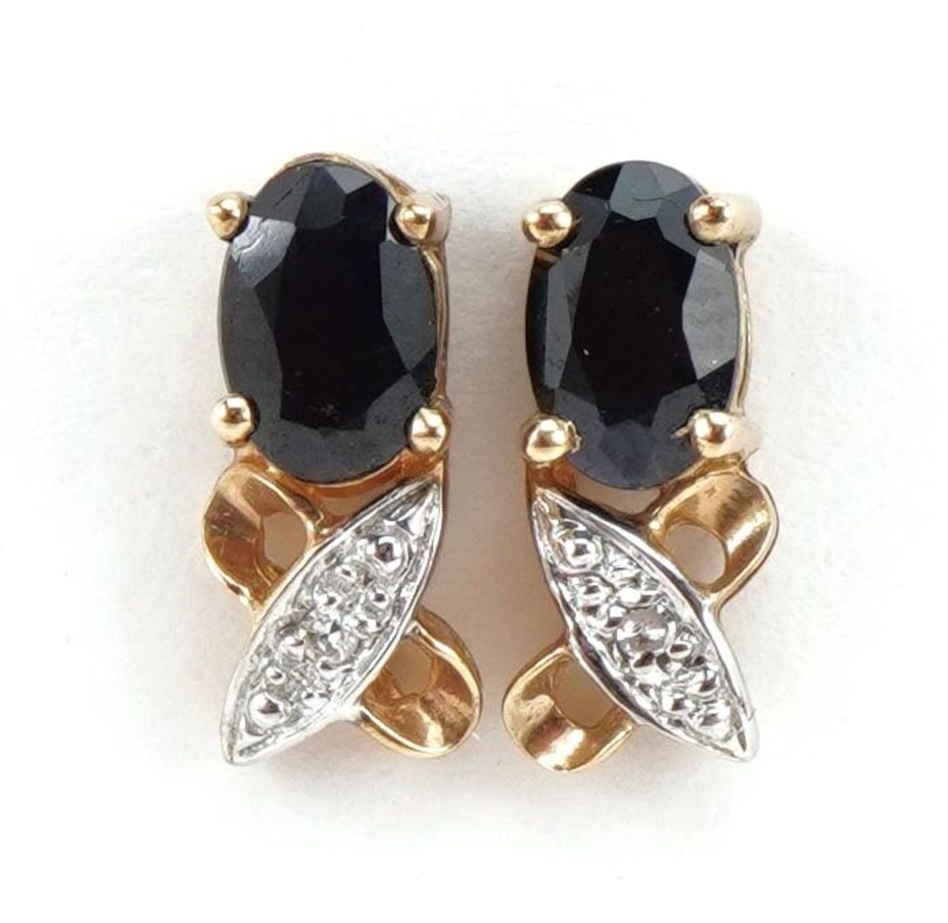 Pair of 9ct two tone gold sapphire and diamond stud earrings, 1.1cm high, 1.4g