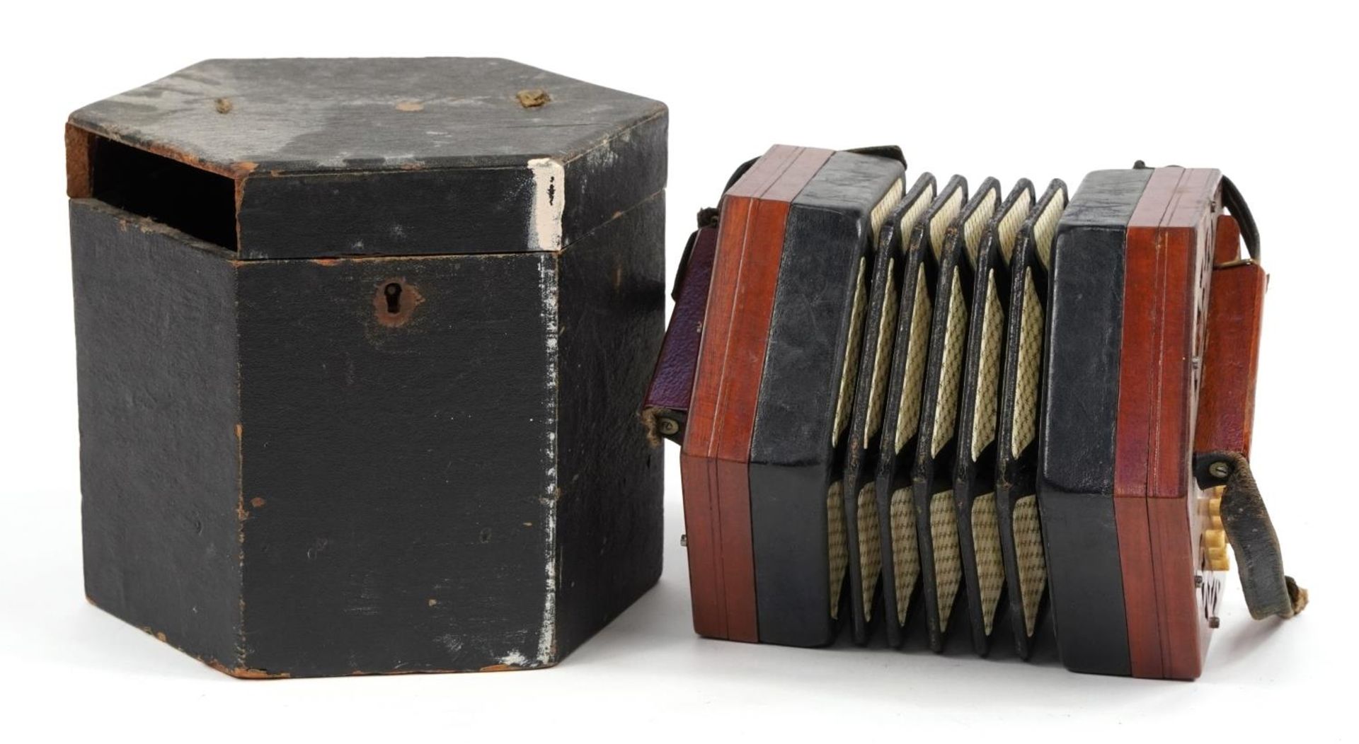 Lachenal & Co mahogany cased thirty one button concertina with case, retailed by Douglas & Co, 7