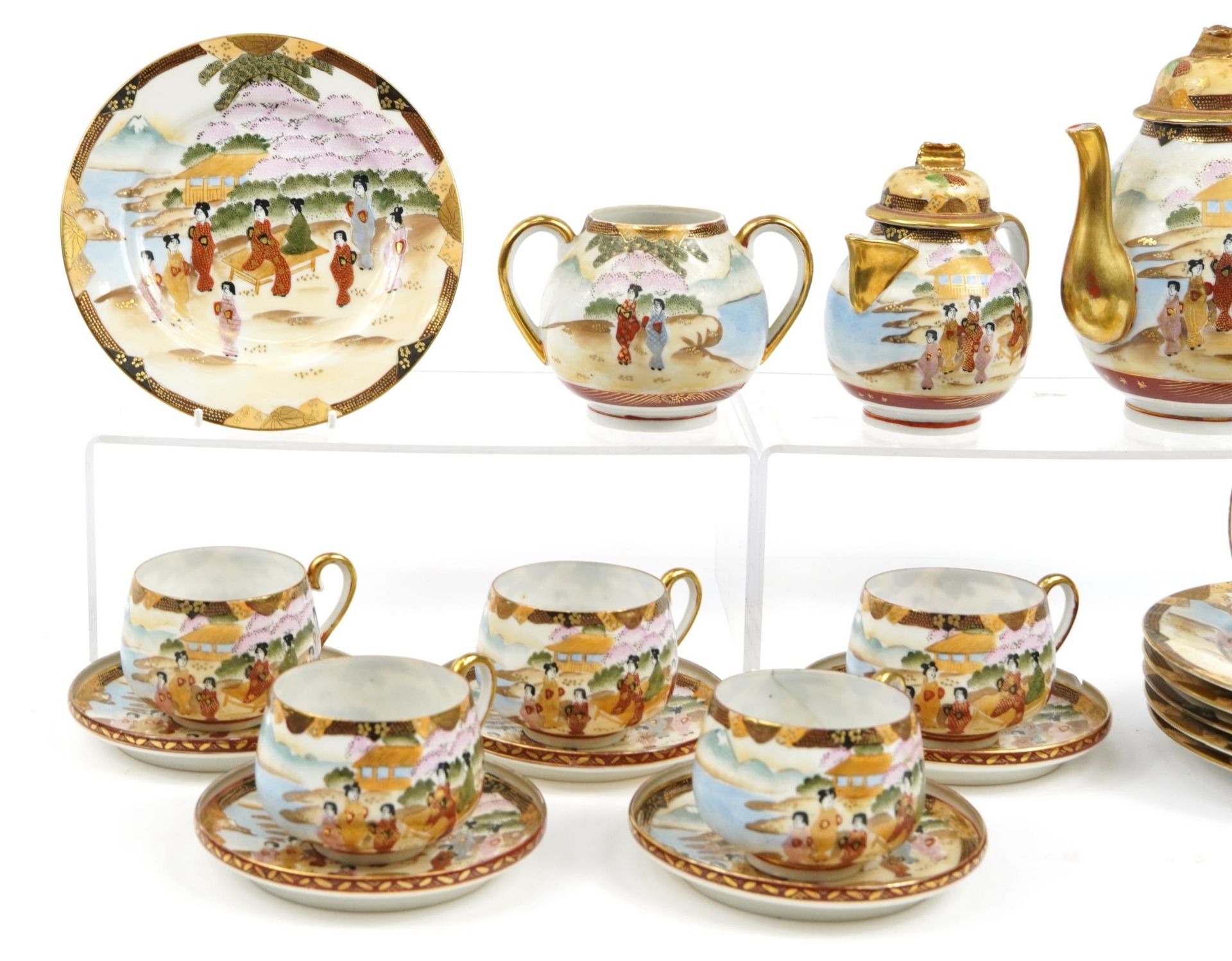 Japanese porcelain tea service hand painted with figures including a teapot and trios, the largest - Image 3 of 5