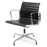 Charles Eames for Vitra, ea 108 swivel chair chair with black leather uphostery, Vitra label to