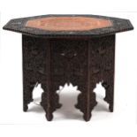Anglo Indian octagonal oak lamp table profusely carved with birds and fish amongst foliage, 60cm H x