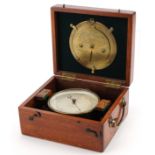 Negretti & Zambra of London, brass cased wall hanging compensated barometer housed in an oak case