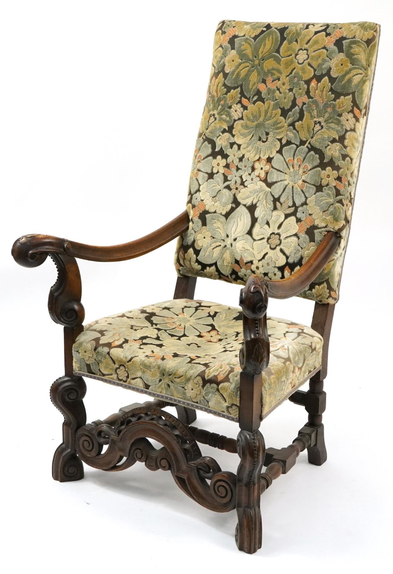 Antique carved oak framed throne chair with floral upholstered back and seat, 119cm high