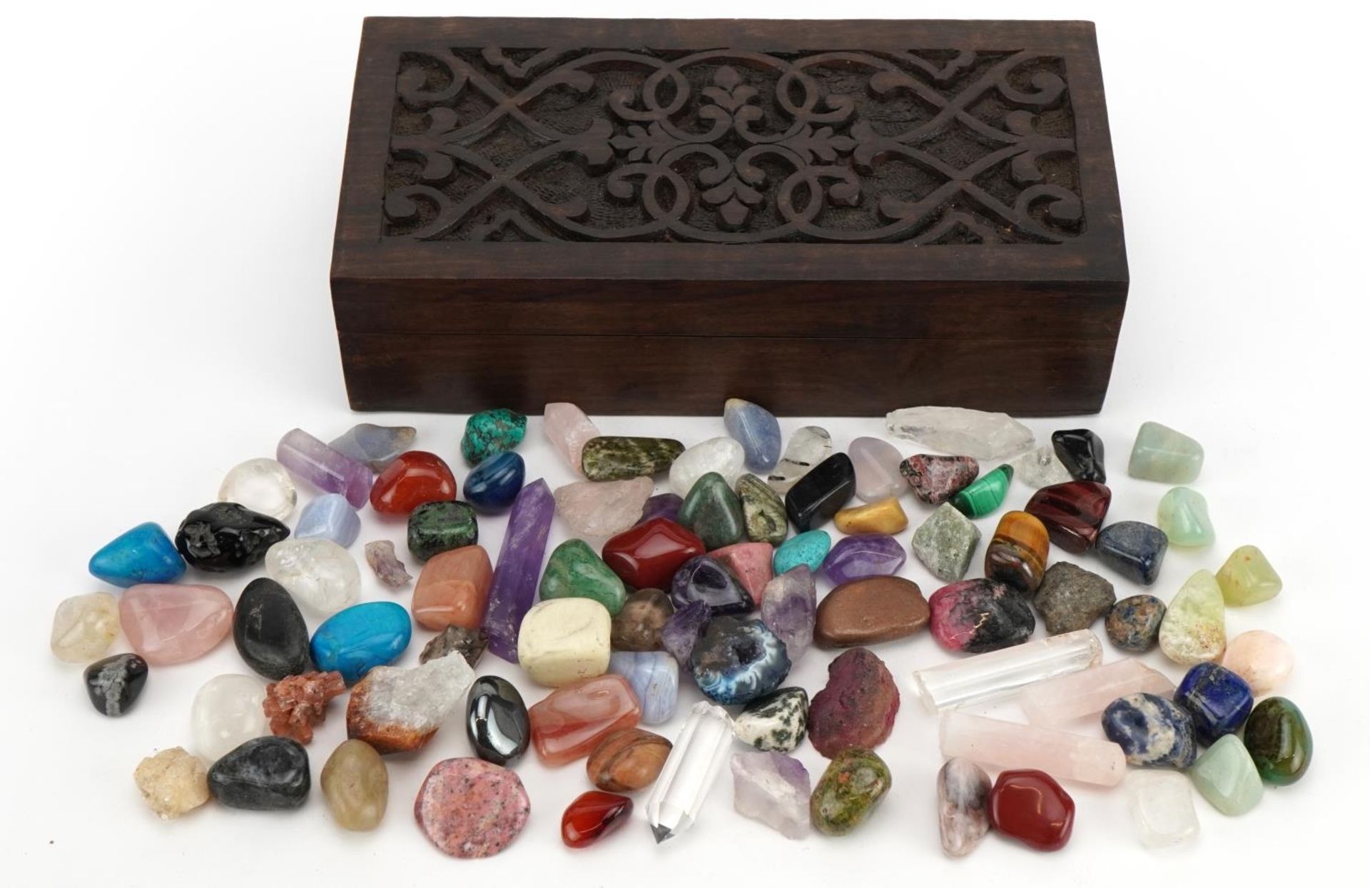 Collection of rock minerals and specimens including rose quartz, tiger's eye, turquoise, lapis